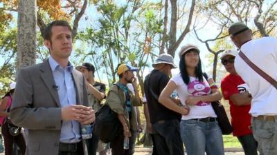 Will Grant with some of the thousands of Venezuelans waiting to pay their respects