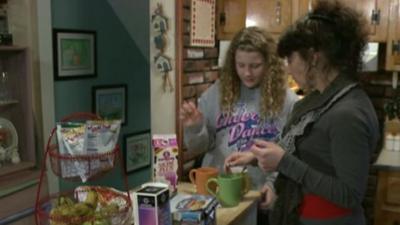 Woman and daughter in kitchen