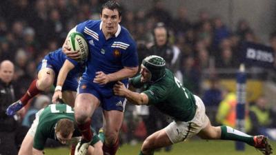 France's Louis Picamoles is tackled by Ireland's Rory Best