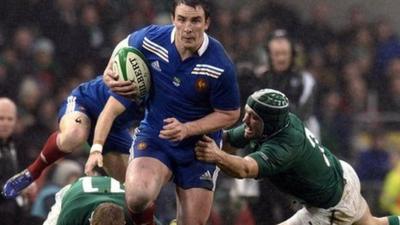 France's Louis Picamoles is tackled by Ireland's Rory Best