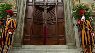 The doors of the Sistine Chapel being locked