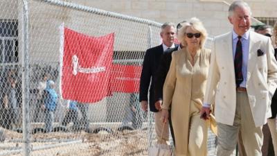 Prince Charles and the Duchess of Cornwall at a refugee camp in Jordan