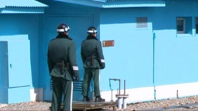 Officers at the border between North and South Korea