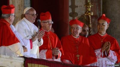 Newly elected Pope Francis I appears on the central balcony of St Peter's Basilica on Wednesday in Vatican City, Vatican