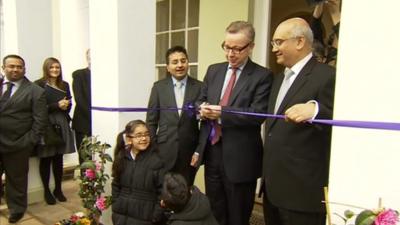 Michael Gove cuts the ribbon