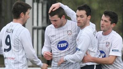 Coleraine players celebrate Stephen Lowry's goal against Dungannon Swifts