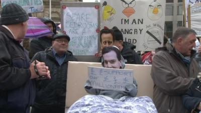 People demonstrating against "bedroom tax"