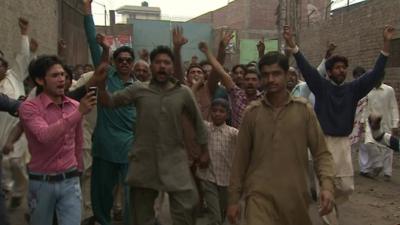 Demonstrators against violence in Lahore