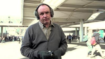 David Reid wearing Bluetooth earmuffs