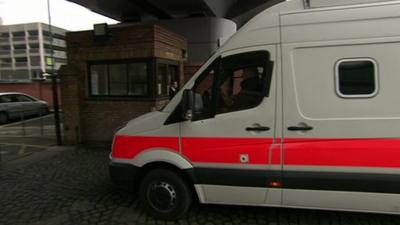 Police van arrives at court