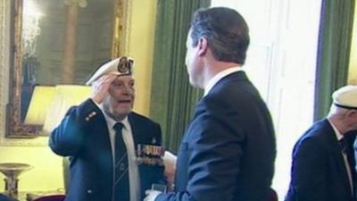 A veteran receives his medal