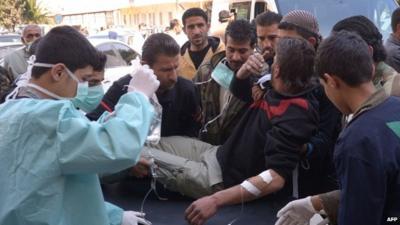 Man on stretcher purportedly after chemical attack