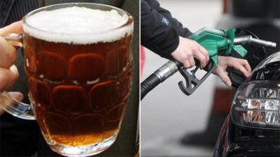 Pint of beer and petrol pump