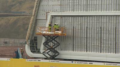 Workmen on construction site