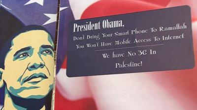 Poster in Ramallah of US President Barack Obama