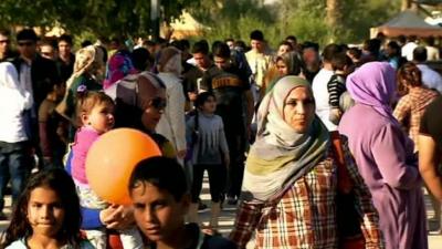 Iraqi families enjoying the sunshine in a park in Baghdad