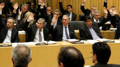 Cyprus lawmakers vote on key bills aimed at securing a broader bailout package from international creditors