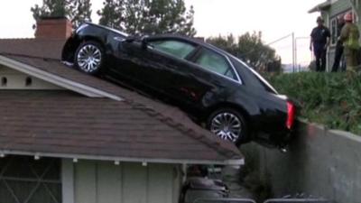 Car on a roof, Glendale, California
