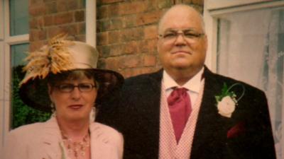 Heather Wilhelms and her husband Tom pictured at a family wedding