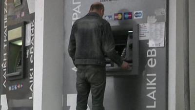 Man at cash machine