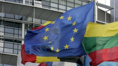 EU flag and national flags are hoisted in front of the European Parliament in Strasbourg