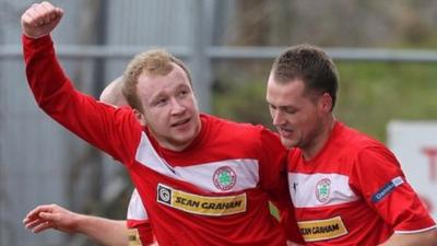 Liam Boyce celebrates his goal with Ciaran Caldwell