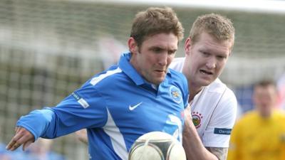 Match action from Ballinamallard against Linfield