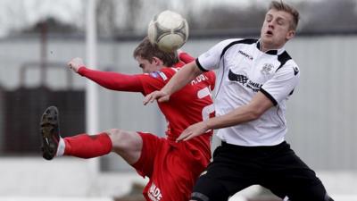 Match action from Lisburn Distillery against Portadown at Ballyskeagh