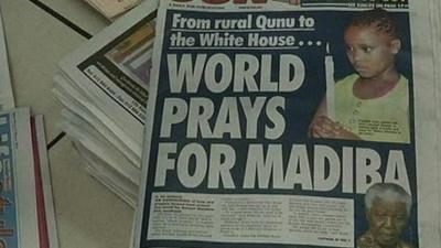 Newspaper front page 'World prays for Madiba'