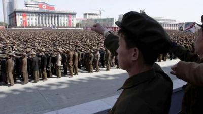 North Koreans at a rally