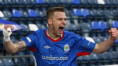 Linfield's Peter Thompson celebrates his goal against Glentoran