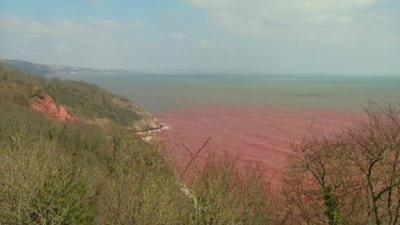 Water stained red by the clay