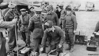 22 December, 1950: An American officer inspects a British cooking area near the front line