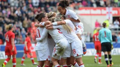 England women celebrate the winner versus Canada