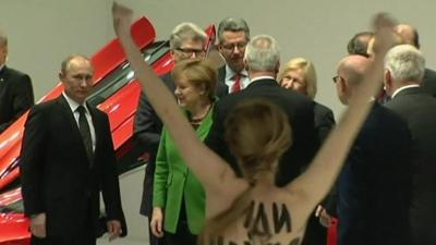 Topless women target Putin in protest