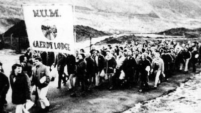 Miners march back to work at Mardy Colliery following the strike