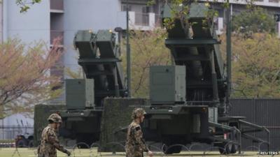 Members of the Japan Self-Defence Forces deploy Patriot Advanced Capability-3 (PAC-3) missiles at the Defence Ministry in Tokyo