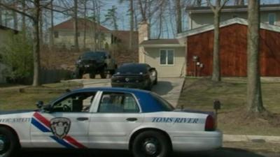 Police car outside a house