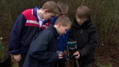 Children taking part in an outdoor lesson