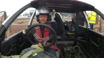 Mike Bushell in a banger racing car