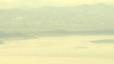 A North Korean village viewed from the South Korean side of the border