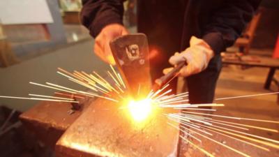 Man making scissors