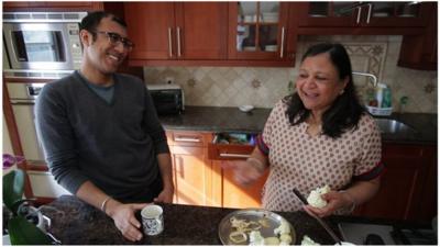 Ravi and Asha Jain in the kitchen