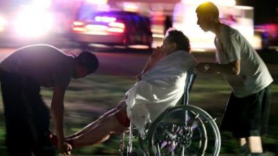 Injured elderly person assisted as a nursing home is evacuated in West. 17 April 2013