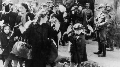 Jews being rounded up in the Warsaw Ghetto after the uprising
