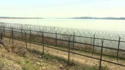 Barbed wire fencing outside Seoul city centre