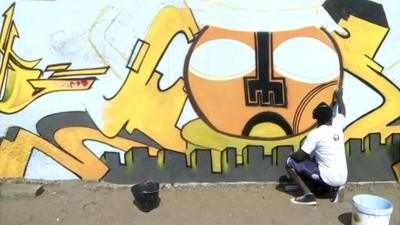 Graffiti artist in Dakar