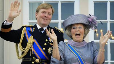 Former Dutch Queen Beatrix, right, and the new King Willem Alexander, left