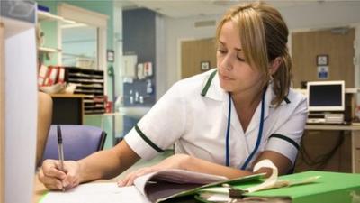 Nurse doing paperwork