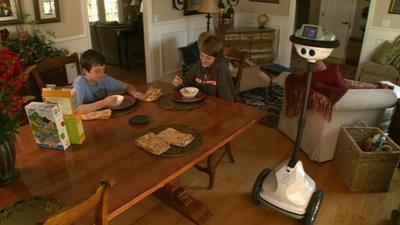 Grady's robot at home with Grady's brothers